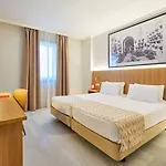 Отель Exe Ciudad De 4*